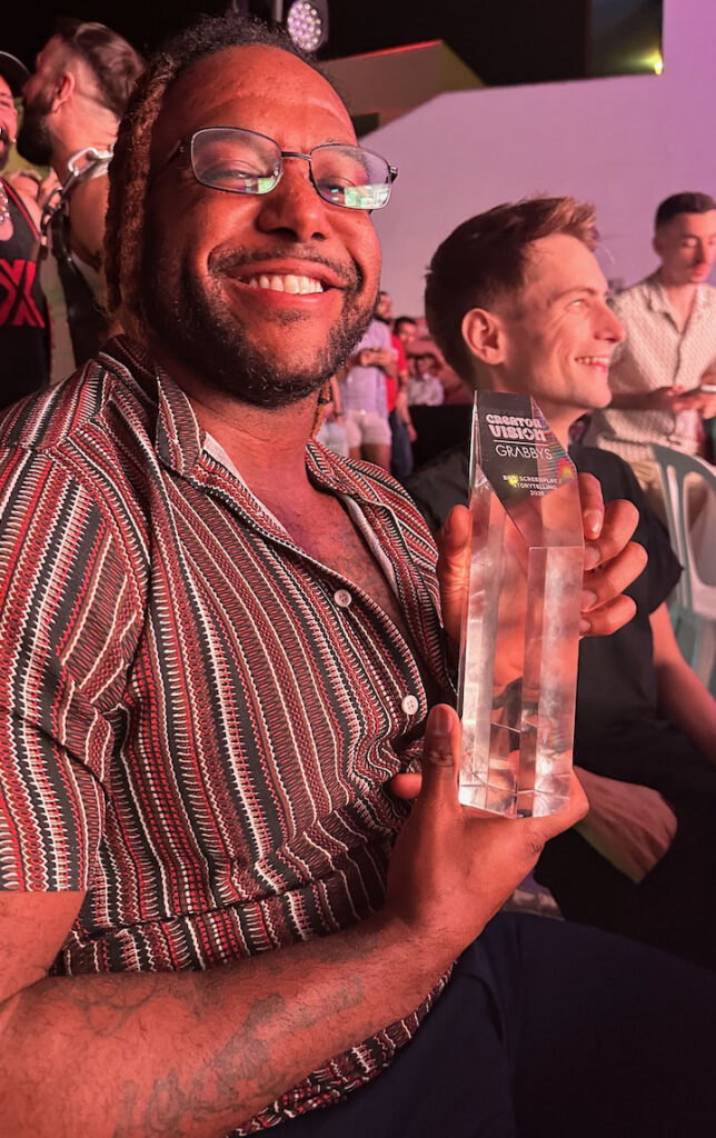 Micah with his GRABBYS win!